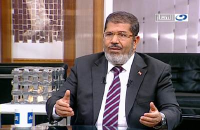 مرسي لرويترز: سأعيد محاكمة مبارك بمجرد فوزي بالرئاسة