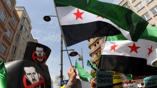 متظاهرون يسخرون على طريقتهم من الرئيس السوري