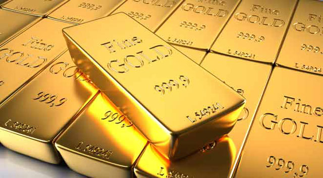ارتفاع الدولار يهوي بأسعار الذهب